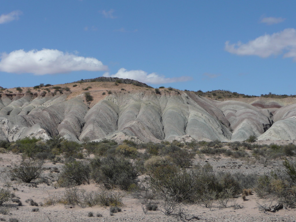 Weird, colourful rock hills.