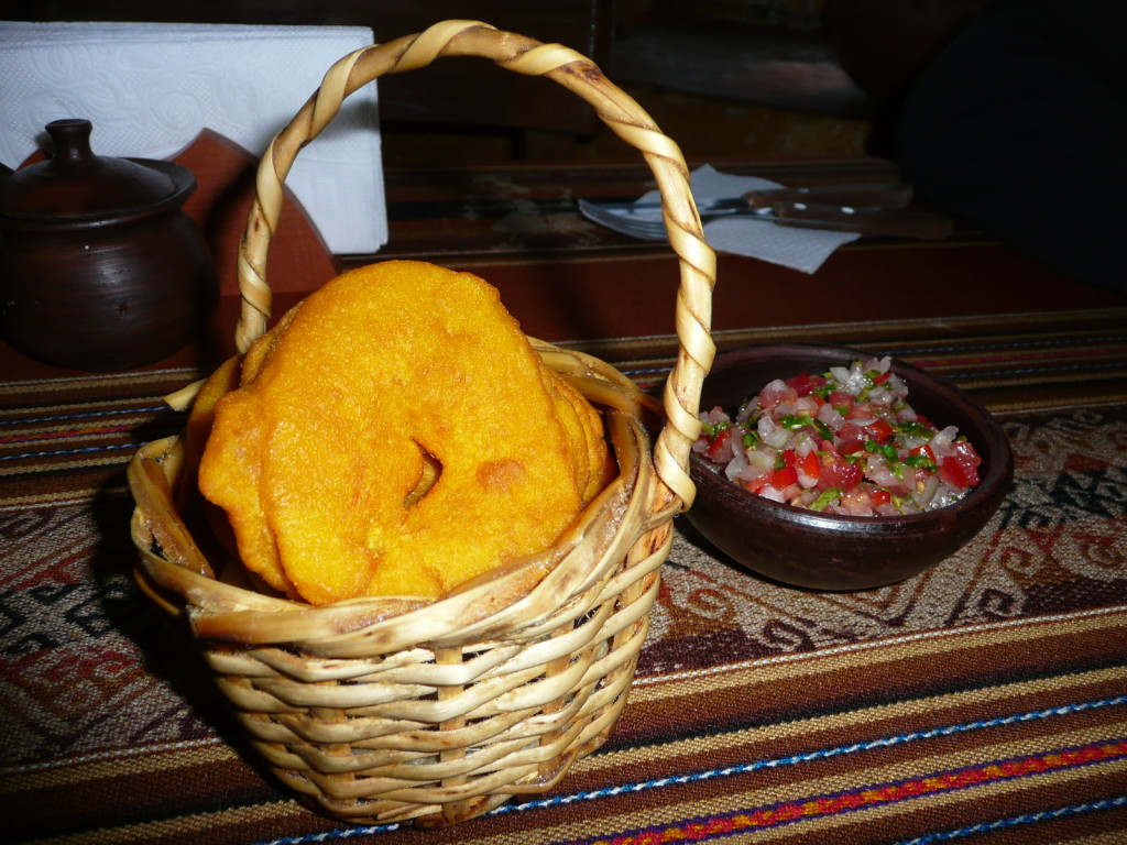 Typical starter in Chile of sopapillas (fried bread) with salsa. Tastes a bit like a doughnut, but unsweet. Very yummy!