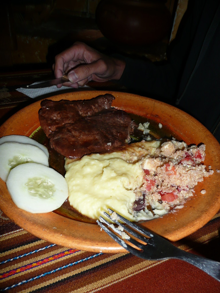 Alpaca steak with northern salad (quinoa, tomatoes, olives, cheese) and mashed potatoes