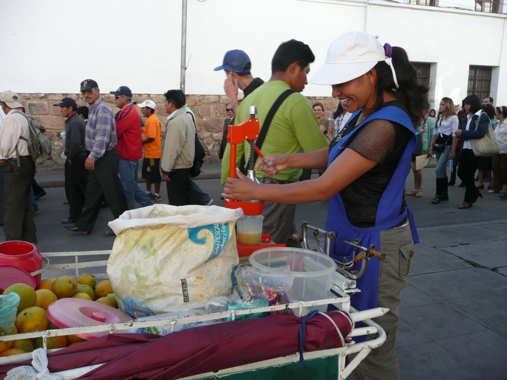 Freshly squeezed juice is available everywhere from these sorts of stands in Sucre. It costs as little as 4 Bolivianos (60 NZ cents). Whatever is left in the container you get as a refill.