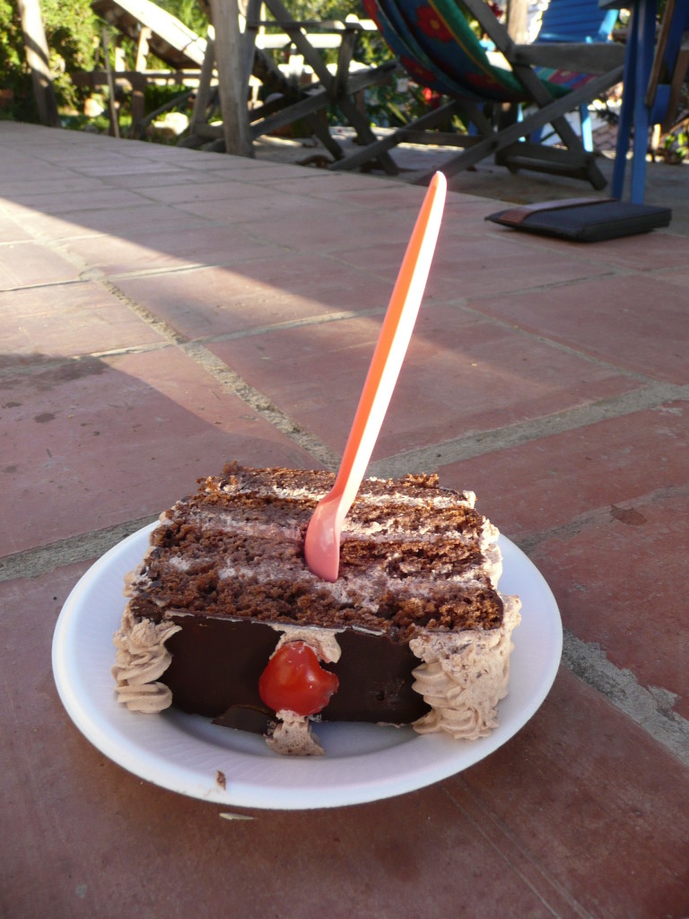 It's very common to buy cake to go, just like this, popped inside a plastic bag. We saw many students walking along eating cake like this. It tasted pretty good too.