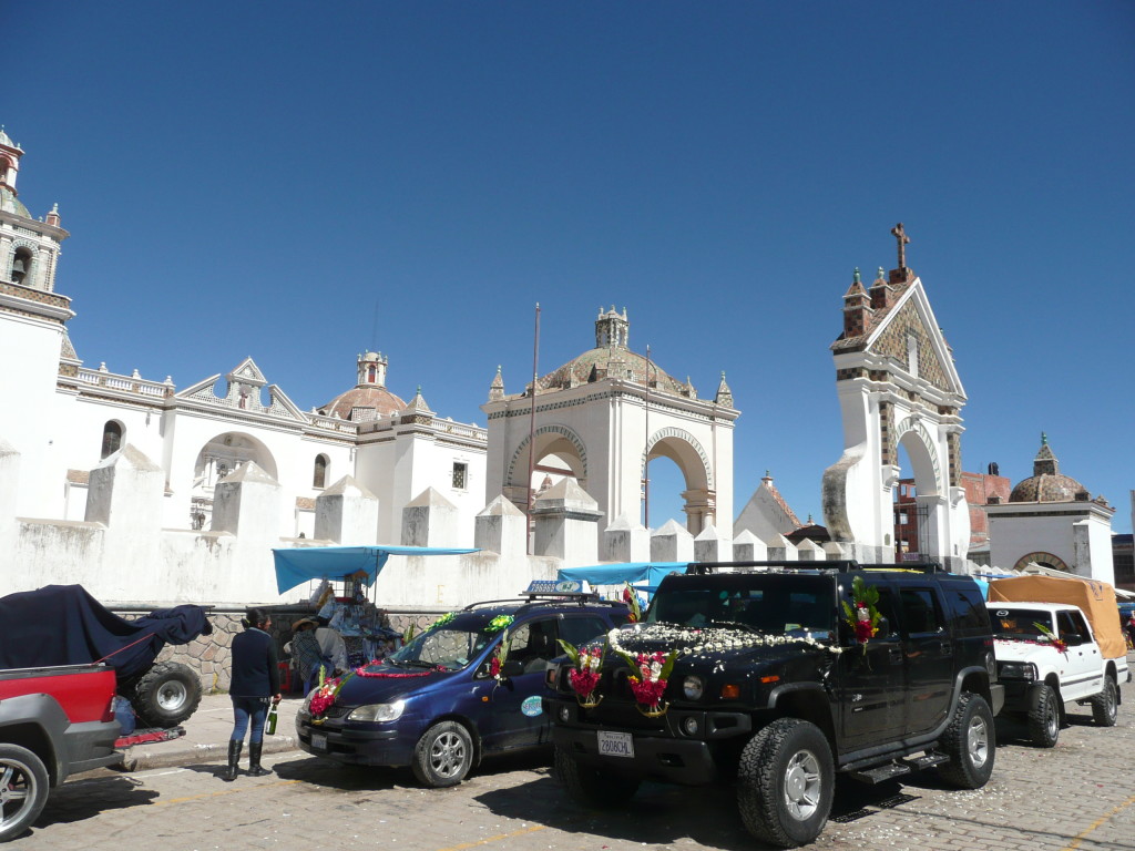 On Saturdays and Sundays you can decorate your car and pay the priest to bless your car, then you spray the car (and engine) with booze and this will protect you on the roads (seeing how people drive they must think that this ceremony means they have become invincible)