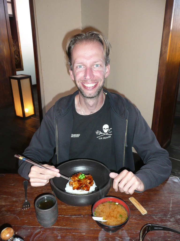 Richard enjoying teriyaki chicken at a Japanese restaurant in Cuzco, our first Japanese meal in six months!