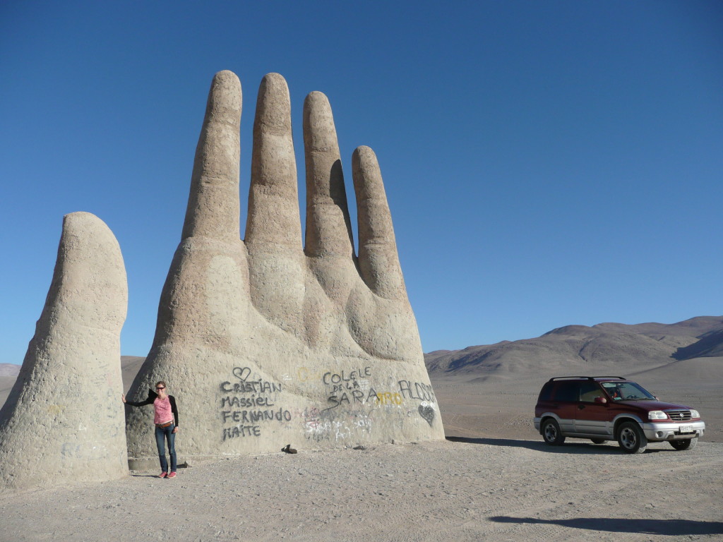 One of the few landmarks in the desert, a massive hand sticking out of the sand