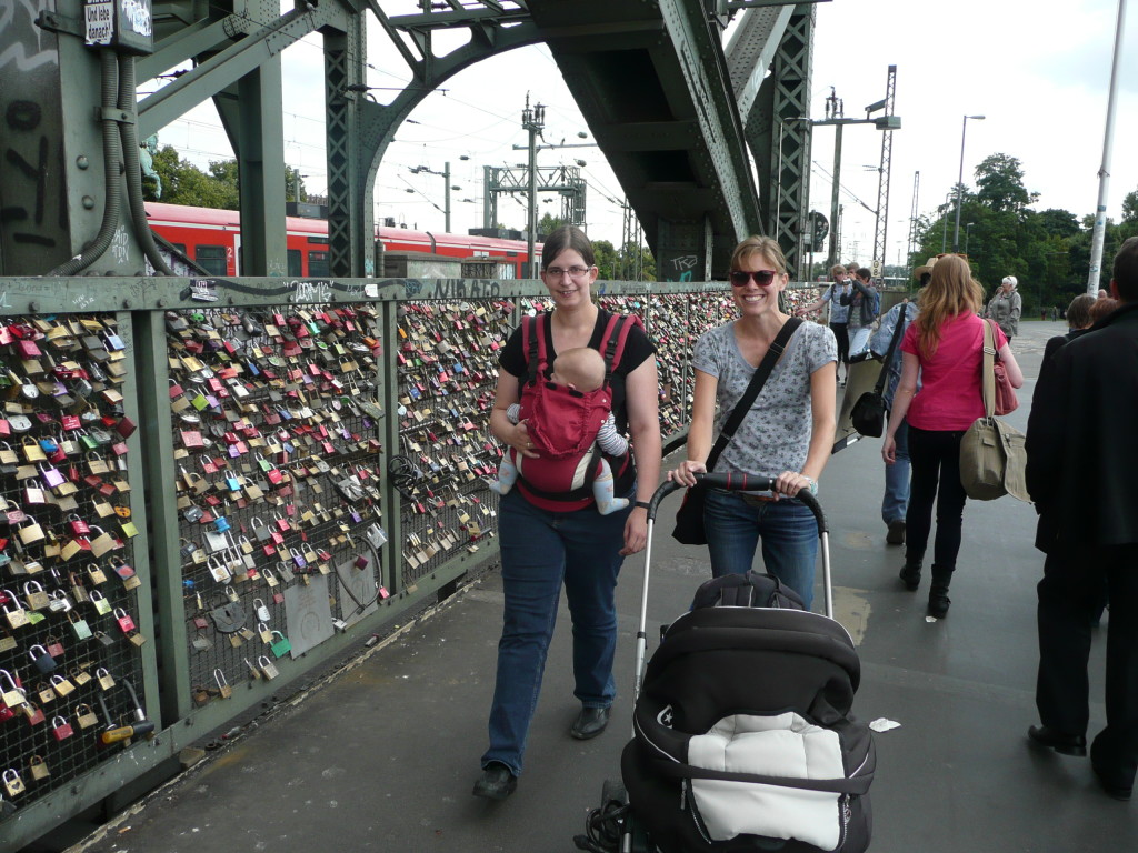 Walking Love Locks Bridge into the centre of Cologne. Sofia got fed up with her stroller so I pushed it while Katharina carried her!