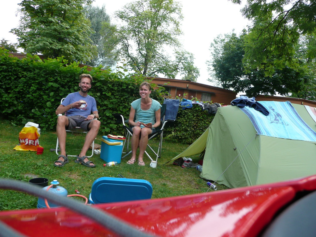 Cramped campsite in Lucerne, this was all the space we had. Here we are eating the freebies the local supermarket gives away to campers