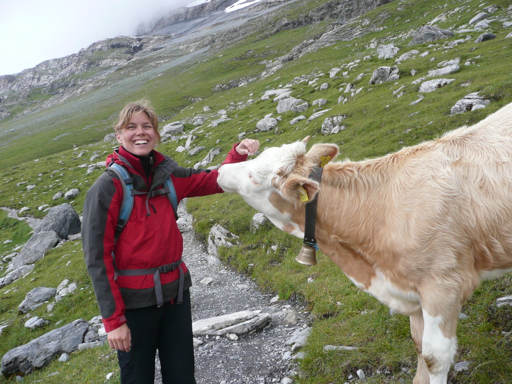 A rather friendly beast is trying to sniff Julia's armpit