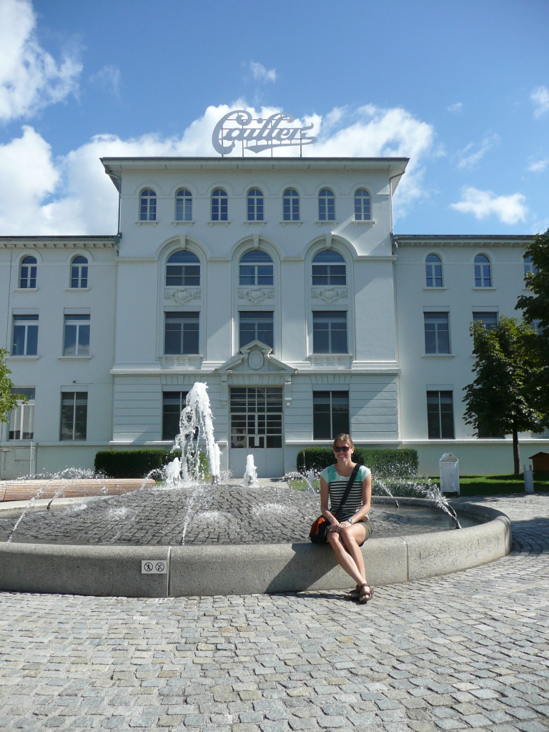 Time for a tour of the Caillier chocolate factory. I could hardly contain Julia for a photo by the fountain, keen as beens!