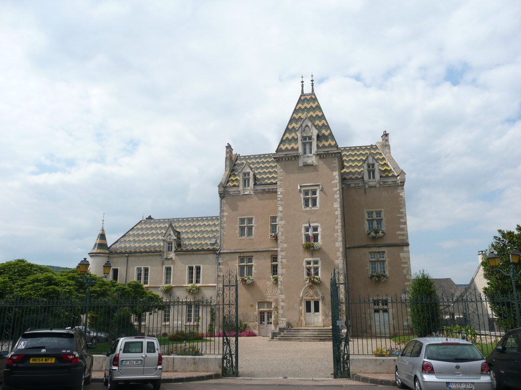 A sort of council for the village works in this beautiful old building with very French style roof.