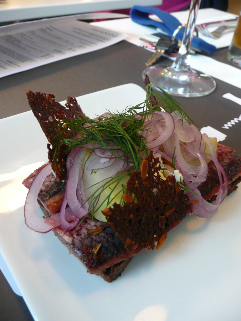 Smorrebrod in Copenhagen.  Here is mine, a spiced herring on rye.