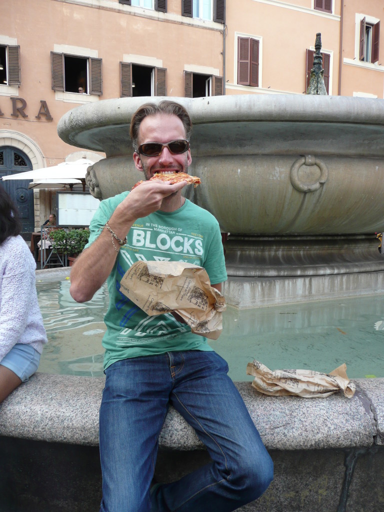 Richard eating yummy takeaway pizza for lunch.