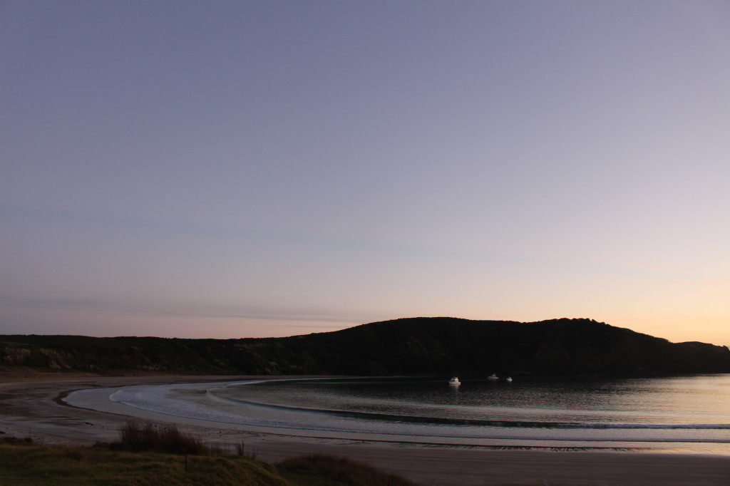 First light over Matai bay begins... it's still darkness.